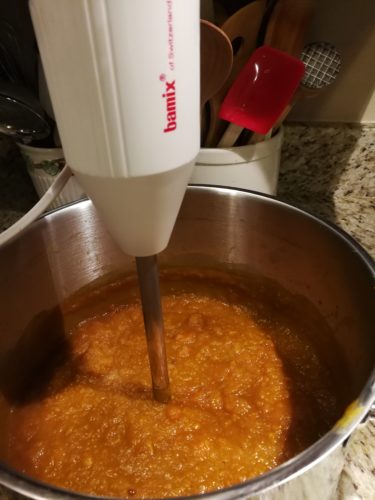 Puree soup with hand blender