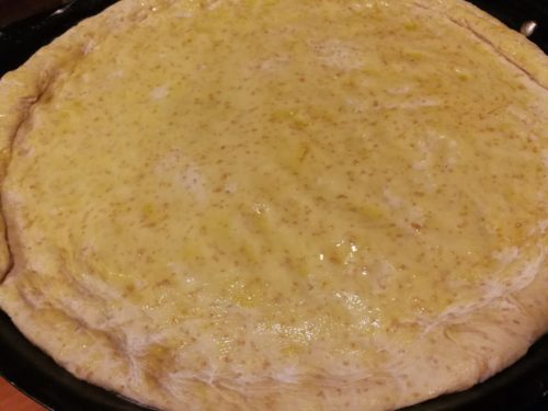 olive oil brushed pizza dough