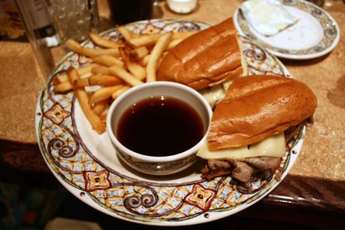 French dip sandwich with au jus sauce for dipping