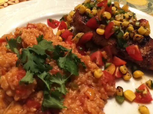 Mexican Rice accompanies a SouthWest style Chicken Breast