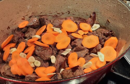 Add carrots and garlic