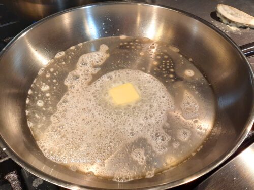 Melt the butter in the skillet