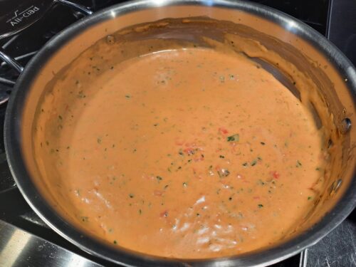 Creamy Easy Queso Dip in the pan is ready to serve or chill to serve later (Photo Credit: Adroit Ideals)